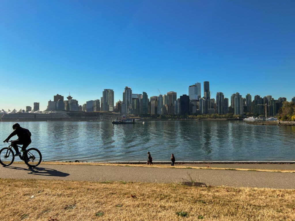 Stanley Park in downtown Vancouver, Canada is one of the best things to do in Vancouver. You can bike the seawall, visit the totem poles, take in the city views and so much more at Stanley Park.