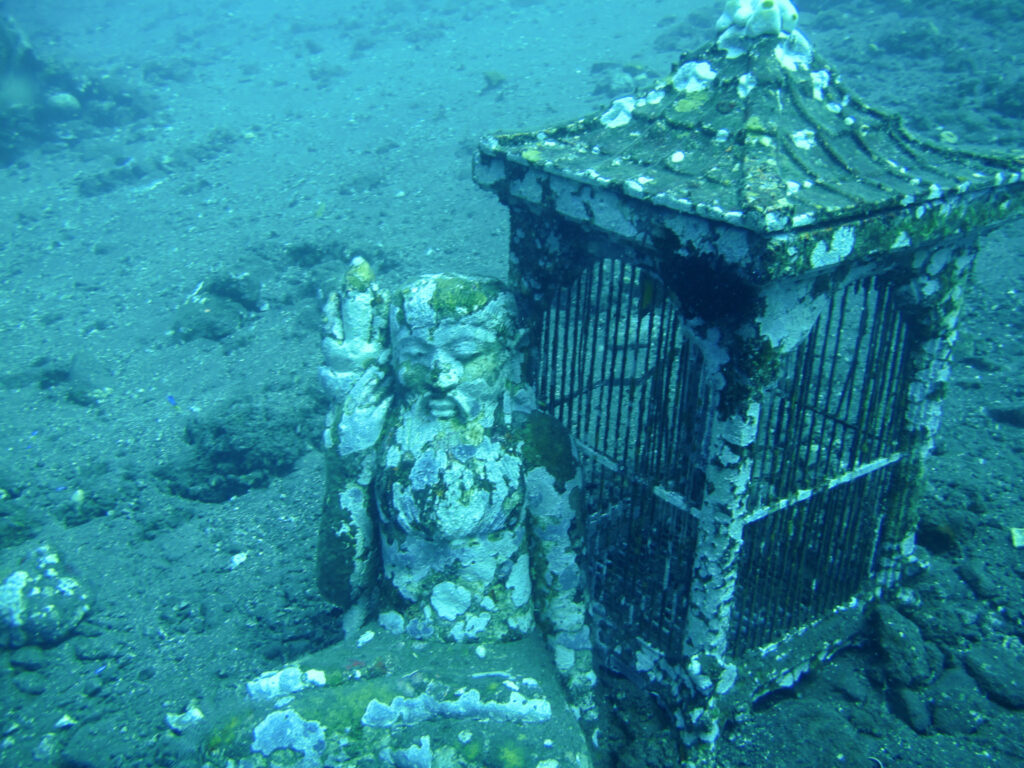 underwater statue while scuba diving