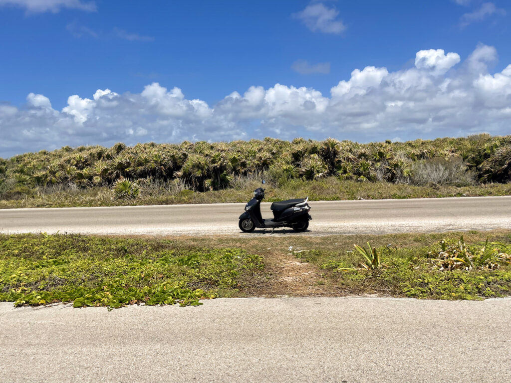 The best things to do in Cozumel is rent a scooter to tour around Cozumel islan